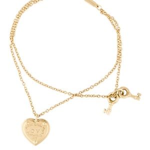 Tiffany and Co Authentic 18kt gold Bracelet with  Heart and Key charms
